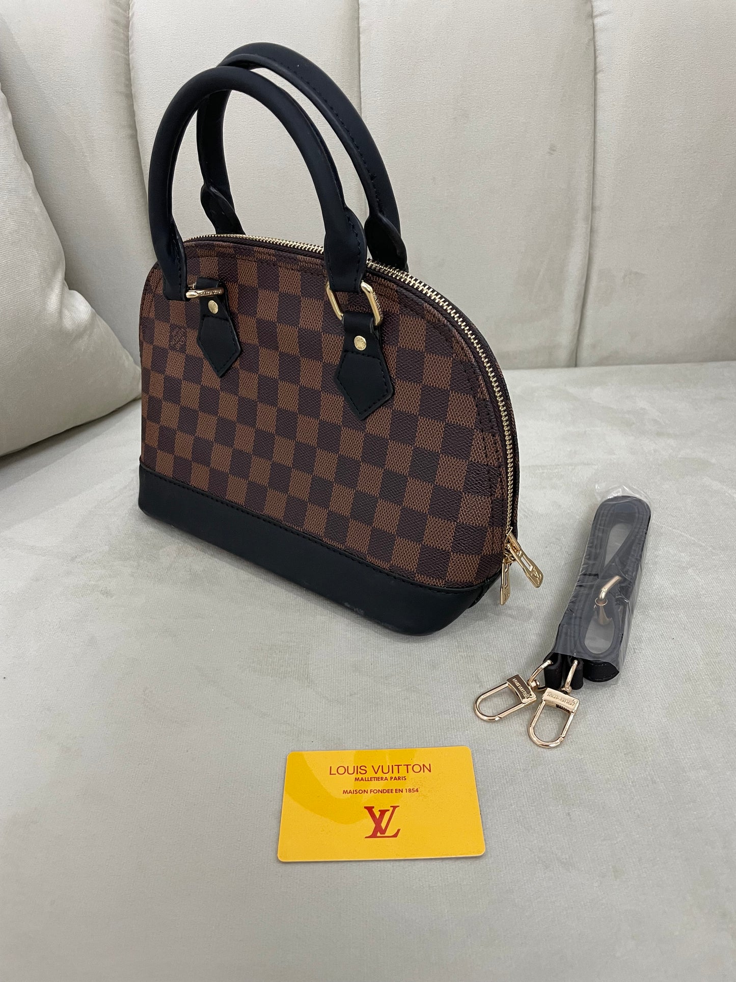 Louis Vuitton- Bolso Mediano Marrón